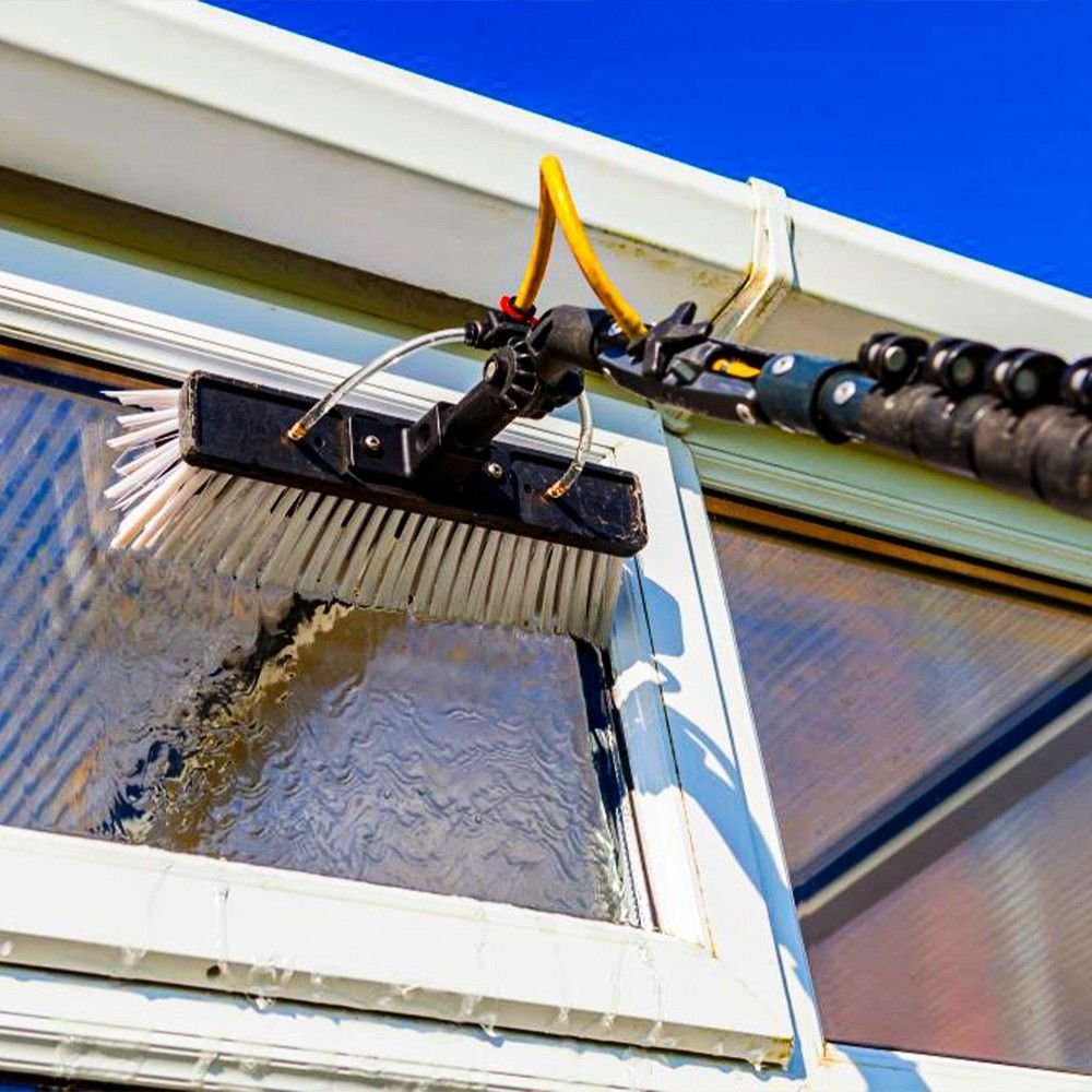 Window cleaner washing residential home windows
