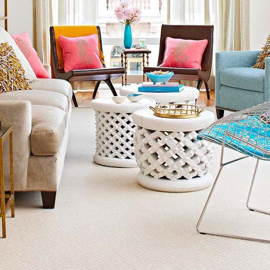 Carpet cleaning technician using steam cleaner on home carpet