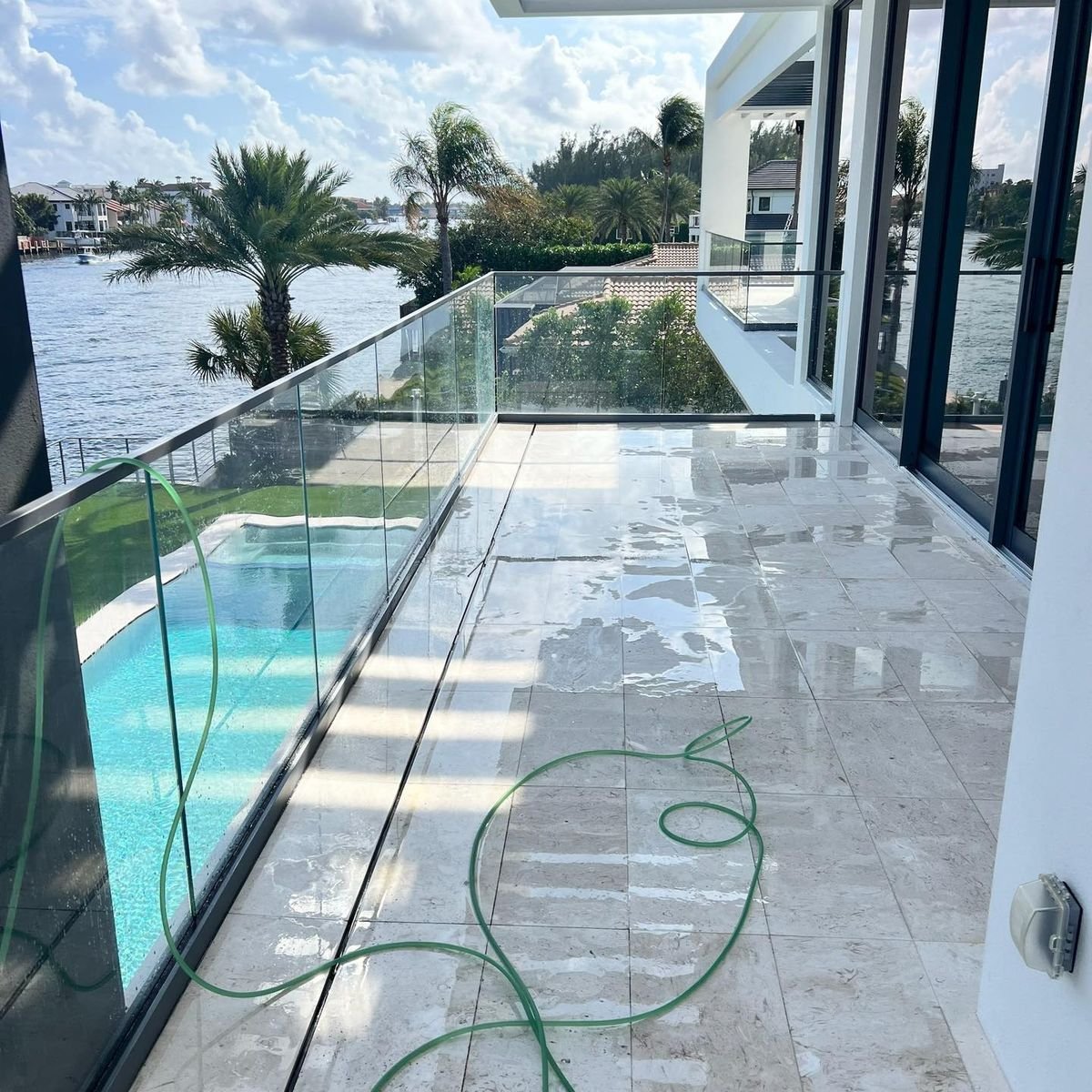 Professional cleaners cleaning exterior house windows