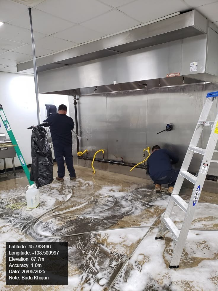 Professional janitorial services team cleaning commercial office space