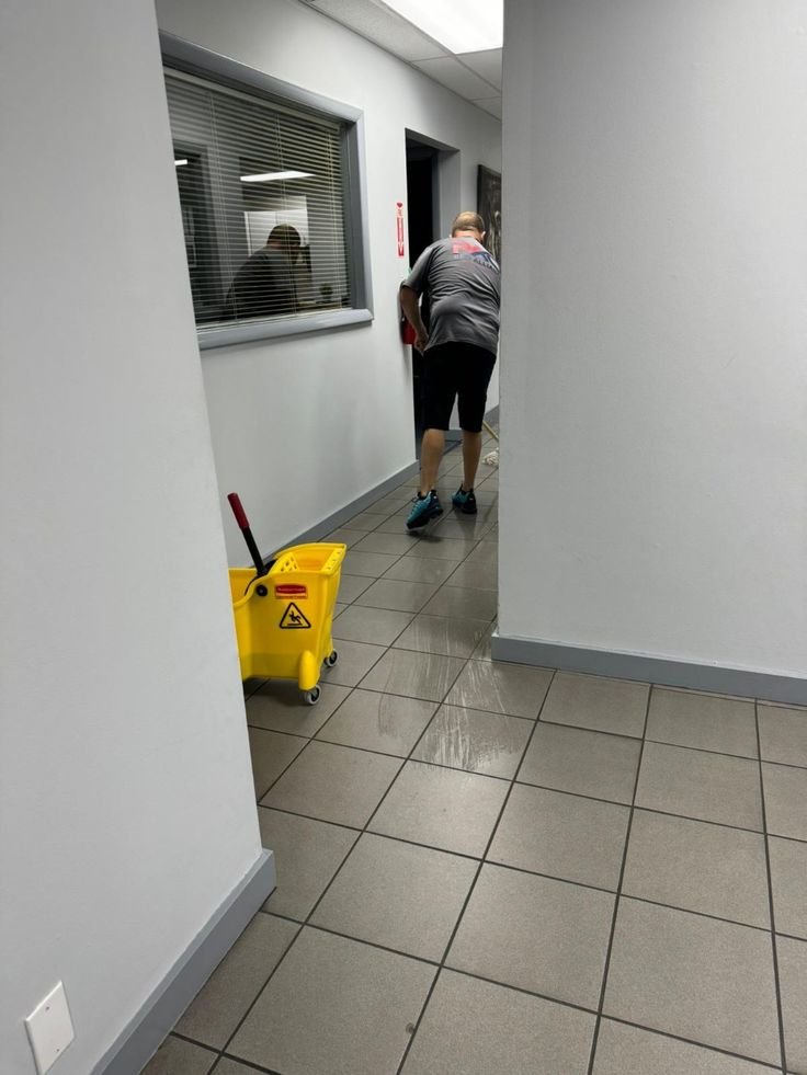 Commercial office cleaning team maintaining a spotless workspace